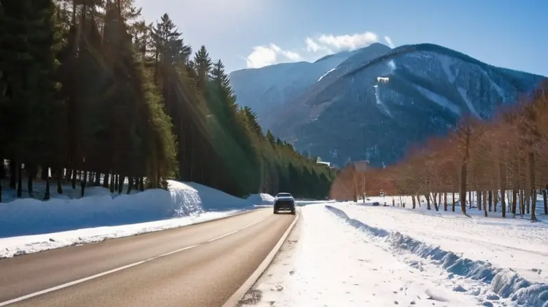 Una calle nevada en Andorra, con nieve brillante, pinos cubiertos de nieve, coches estacionados y montañas nevadas al fondo bajo un cielo azul