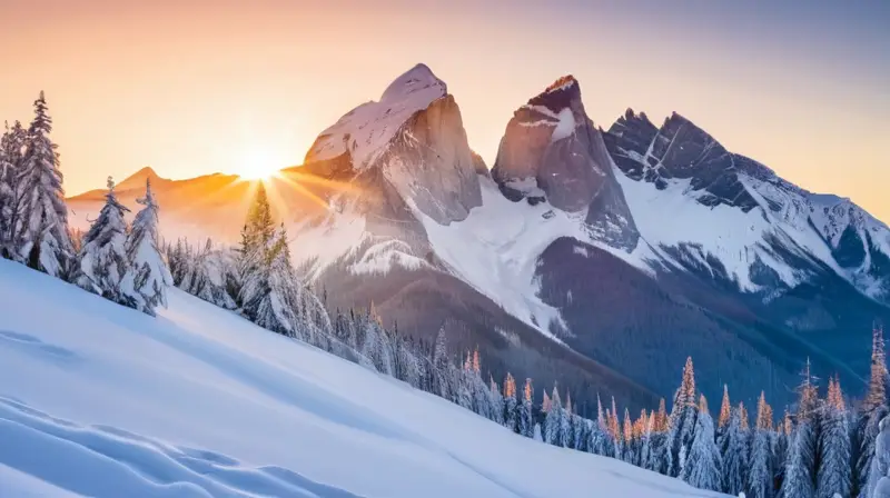 Montañas nevadas y majestuosas bajo un cielo azul