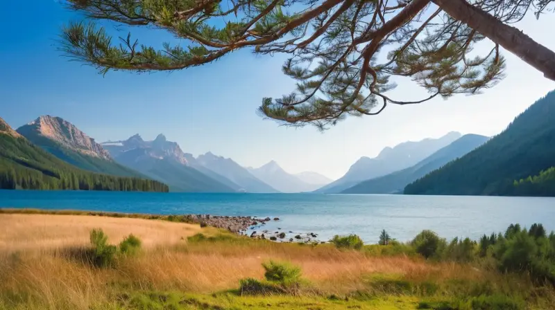 Un paisaje sereno de prados verdes, flores silvestres, un lago cristalino y montañas distantes invita a la exploración y la aventura